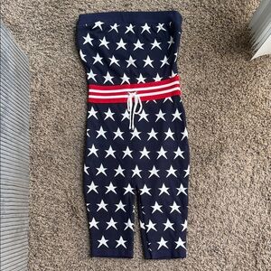 Fashion Nova Navy Star Jumpsuit with Red Stripe